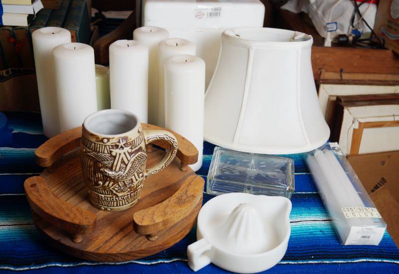lot 1962 image: Lot of Misc. Items - OAK LAZY SUSAN, Vintage Sunkist Juicer, Candles, Mug and More