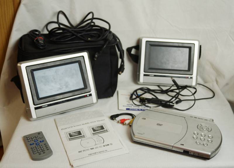 lot 2101 image: Portable DVD System - Player with Dual LCD Screens and carrying case Everything you need