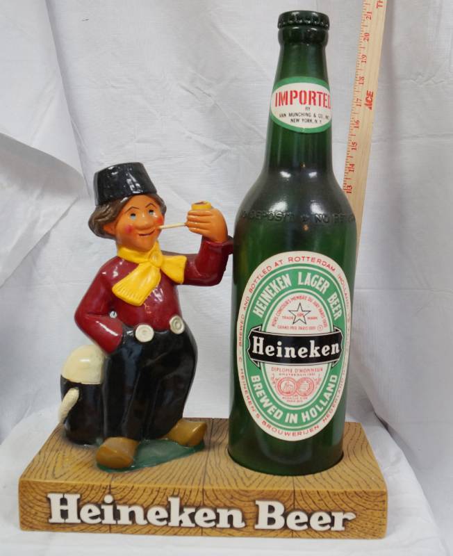 lot 1899 image: Vintage Heineken Beer Statue Display Bottle and Man with Pipe - Man Cave item