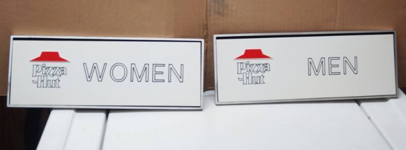 lot 2062 image: Set of Vintage Pizza Hut Bathroom Gender Decals