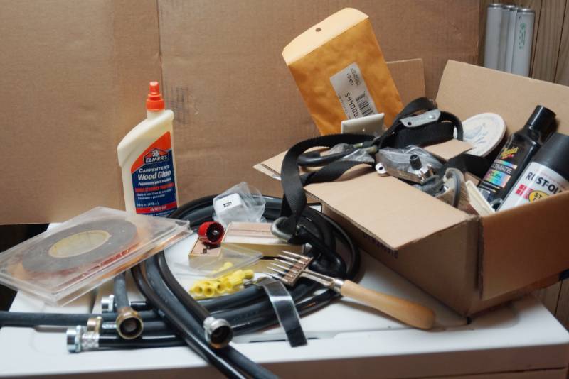 lot 2064 image: Lot of Misc. Handyman Items - Hoses, Glue and More