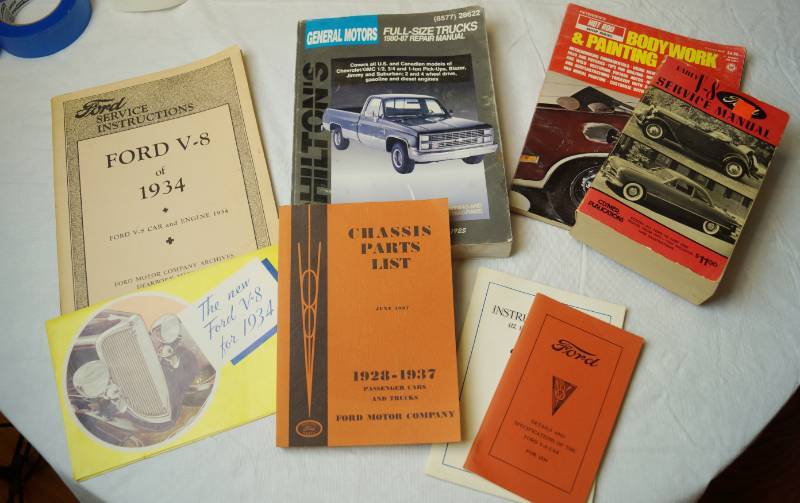lot 2195 image: Lot of Misc. Automotive Books - Vintage V-8 Ford Promo Materials, Parts Lists and More COOL LOT