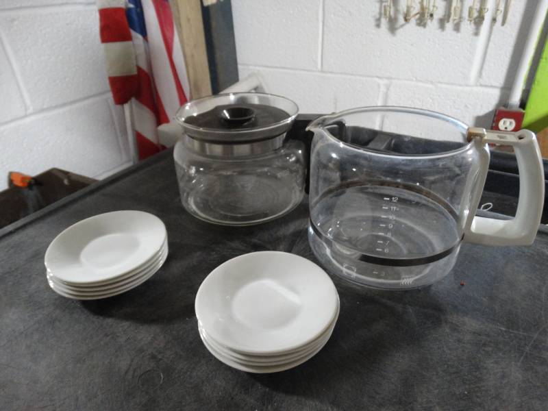 lot 17659 image: Lot of 2 coffee pitchers & small plates.