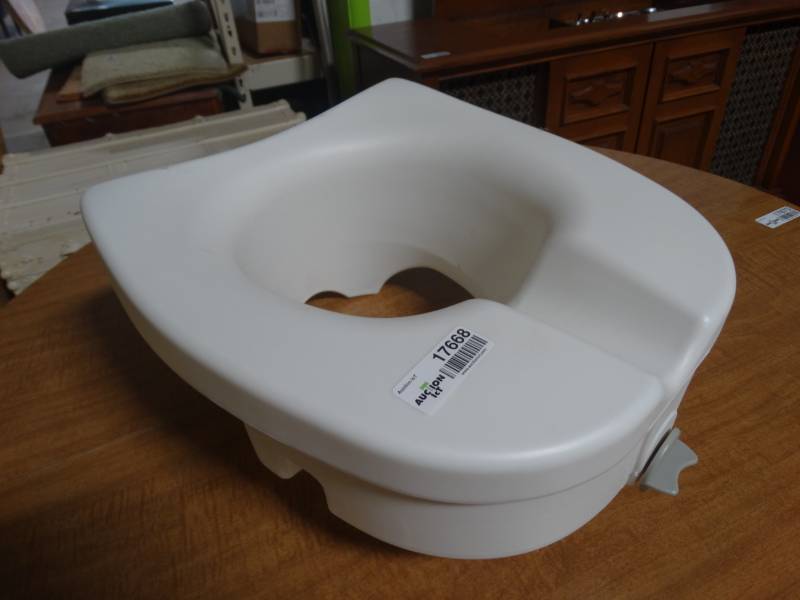 lot 17668 image: Rised toilet seat.