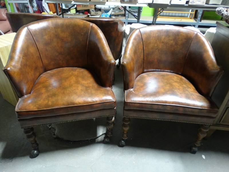 lot 17696 image: 4 Matching brown chairs on wheels.