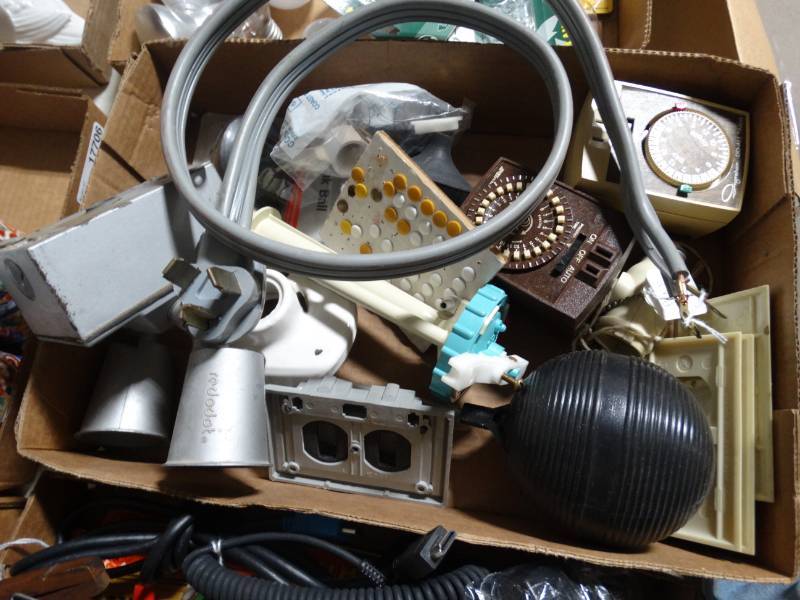 lot 17707 image: Lot of flood light, timers, dryer cord, & more.