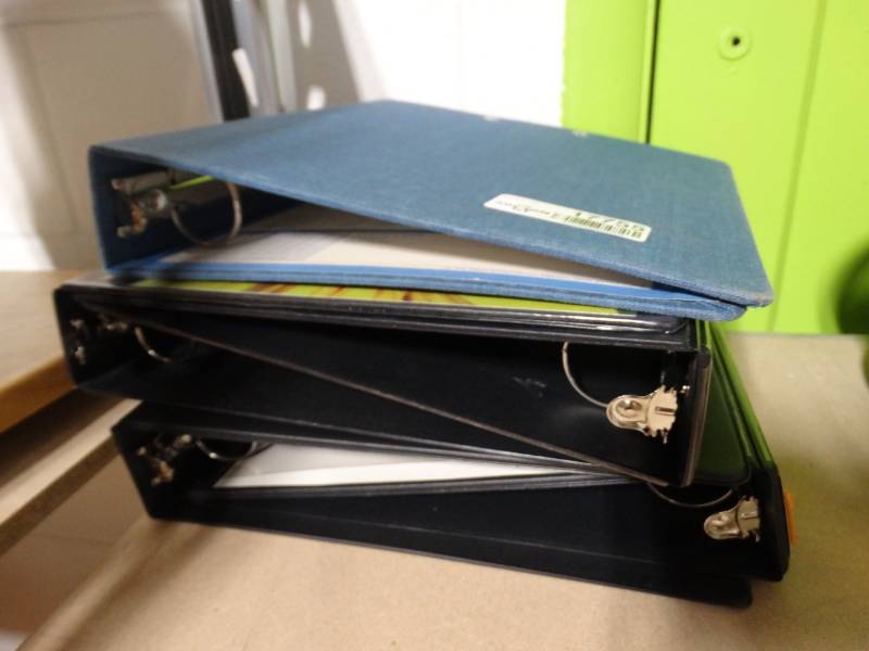 lot 17755 image: Lot of binders.