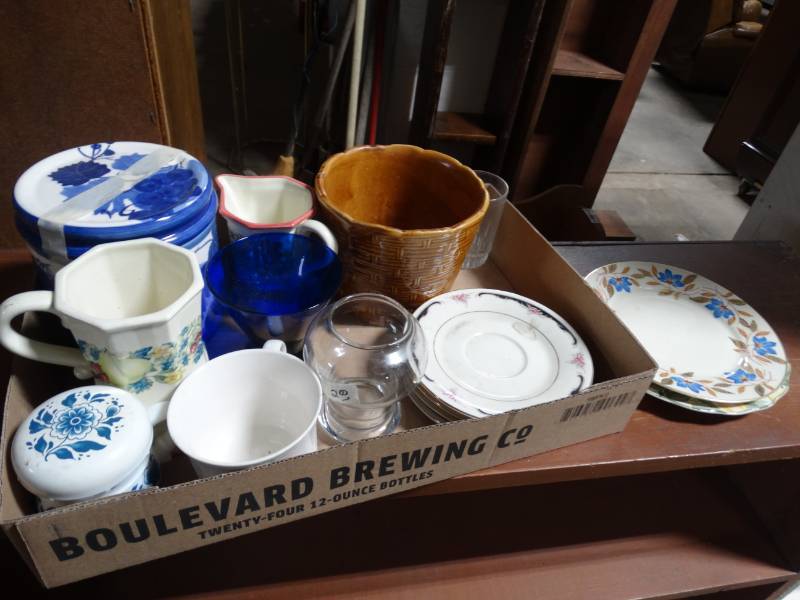lot 17819 image: Lot of Decorative plates, cups, canister and more.