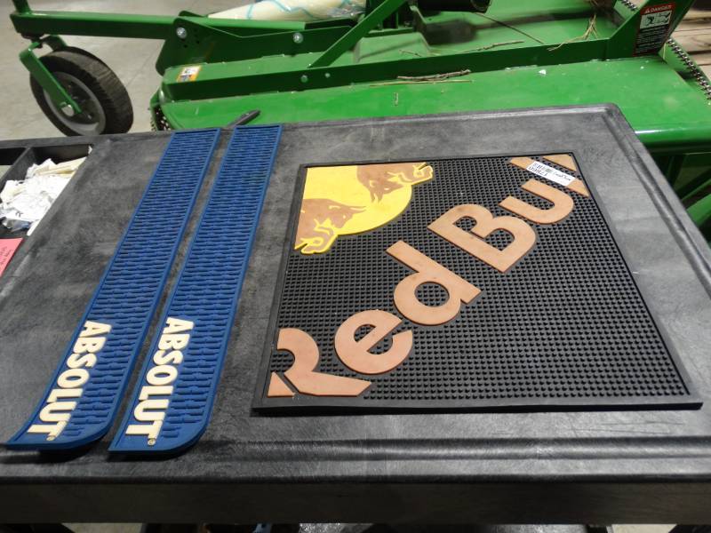 lot 17860 image: 2 Absolut mats, & 1 redbull mat.