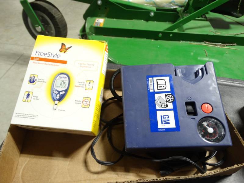 lot 17867 image: Freestyle blood glucose monitoring system, & car air compressor.