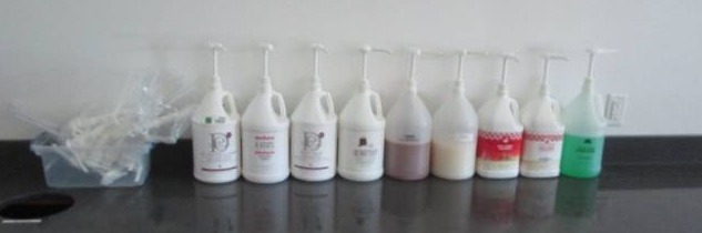 lot 1055 image: Lot of Gallon Jugs of Shampoo  Conditioner  Hand Soap and Pumps