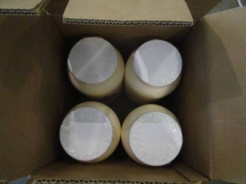lot 1071 image: Four 8lb Plastic Jars of Protein Enriched Cholesterol