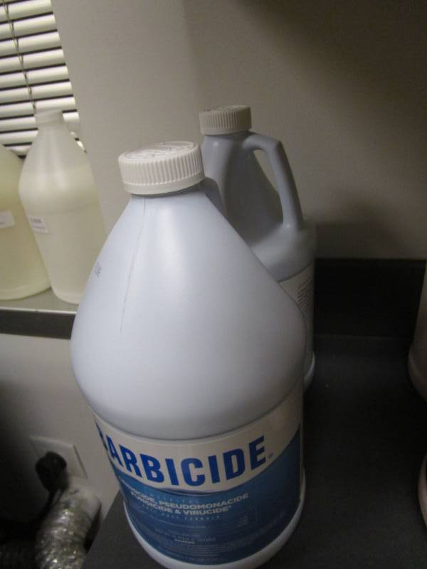 lot 1114 image: Pair of Barbicide Gallon Jugs