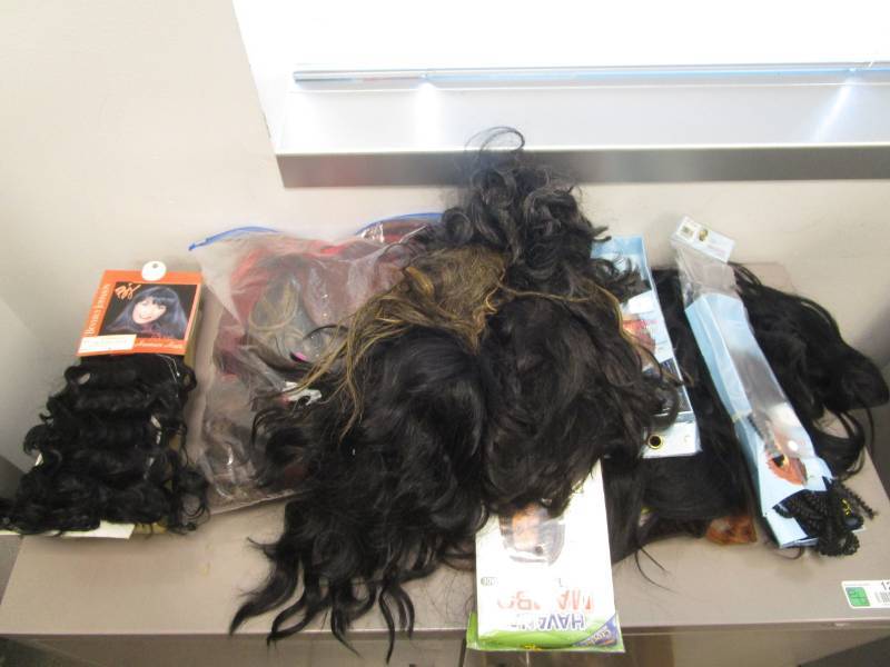 lot 1202 image: Box Lot of Hair Pieces and Wigs