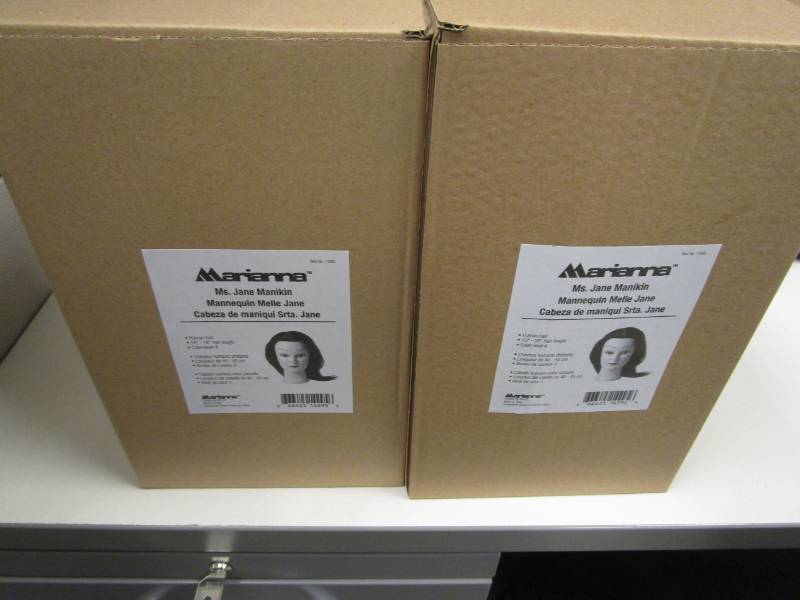 lot 1217 image: Lot of 2 Marianna Mannequin Heads with Hair NIB
