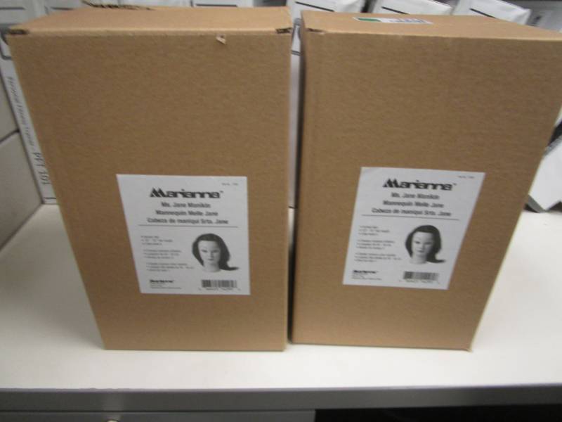 lot 1214 image: Lot of 2 Marianna Mannequin Heads with Hair NIB