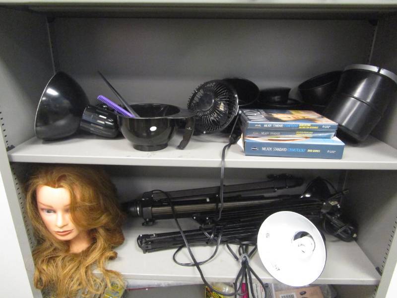 lot 1242 image: Cosmetology DVD, Lights, Mannequin Head, All on Two Shelves