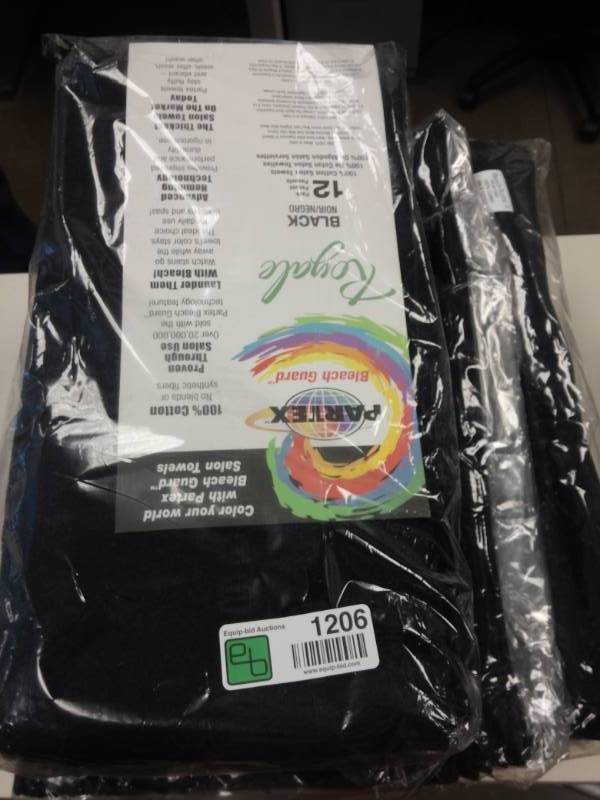 lot 1206 image: Packs of 12 Black Partex Royale Bleach Guard Salon Towels