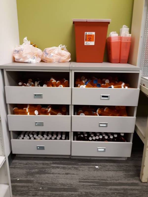 lot 3098 image: Storage Cabinet with Empty Pill  Medicine Bottles Included