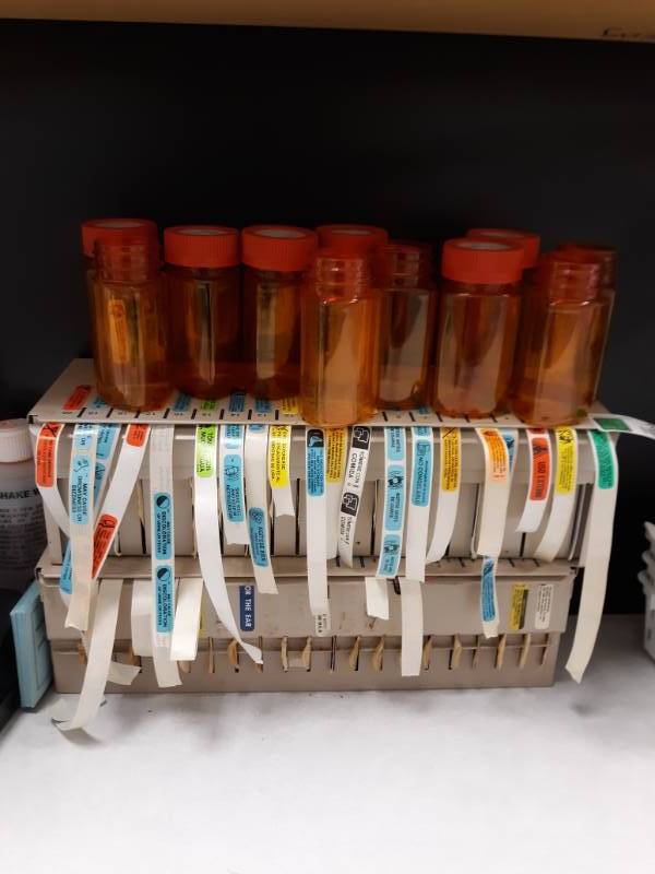 lot 3106 image: Medicine Bottles and Label Dispenser, Labels included