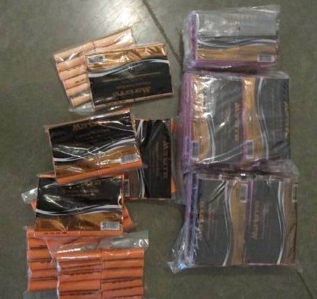 lot 1063 image: Tote of New Perm Rods still in Pkg