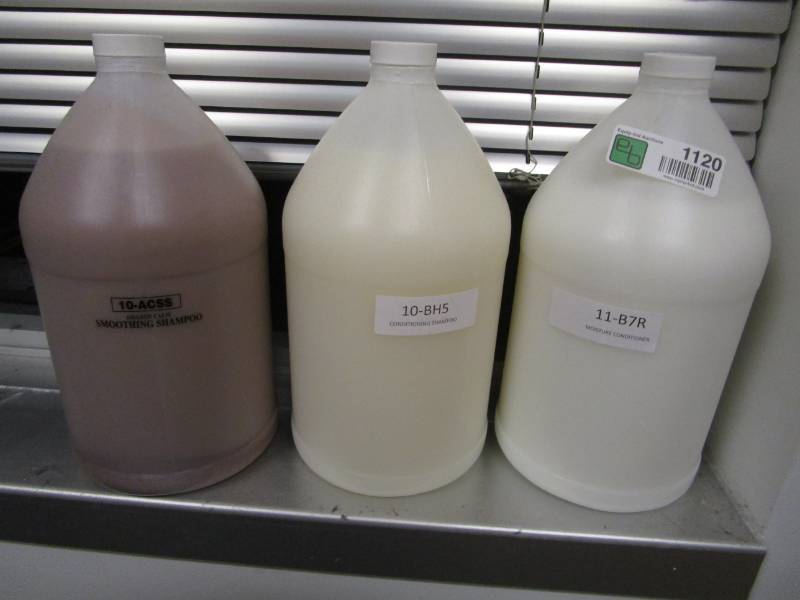 lot 1120 image: Three Gallons of Shampoo and Conditioners