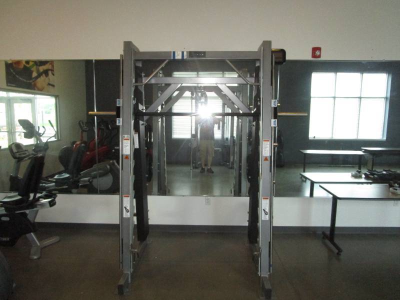 lot 2057 image: Hammer Strength Guillotine Squat RackStand with Weights and Bar