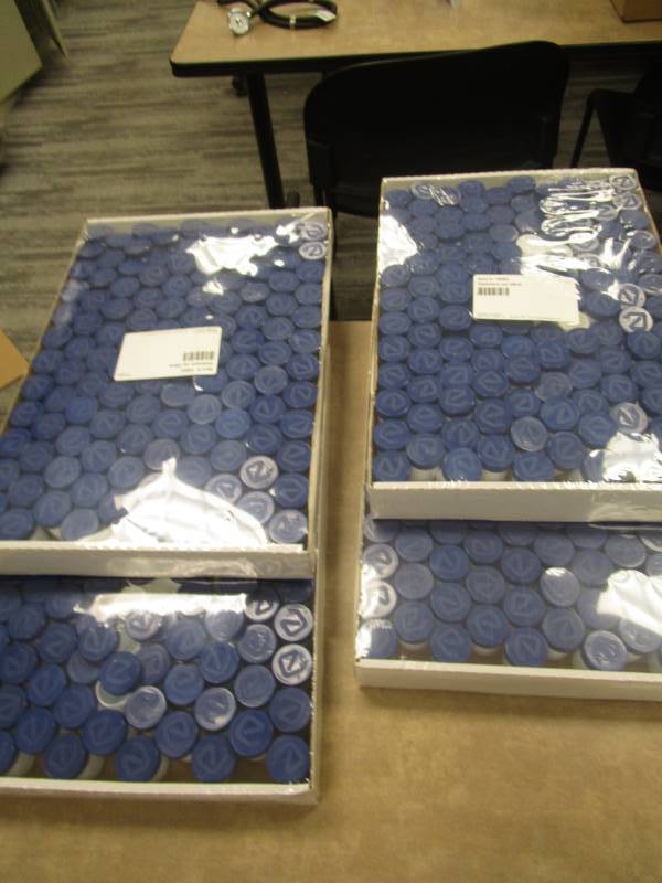 lot 3141 image: Four Boxes of Medicine Bottles caps