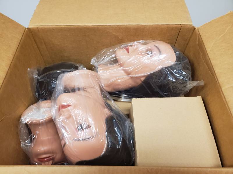 lot 3675 image: Box Full of New Mannequin Heads