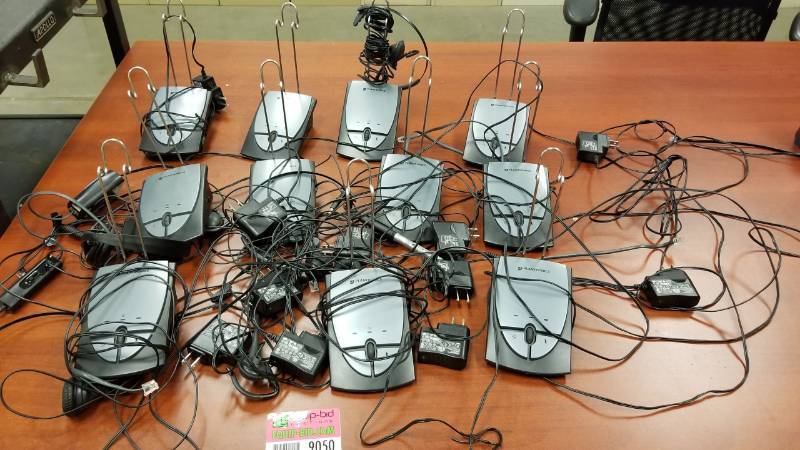 lot 9050 image: Plantronics headsets And bases as pictured