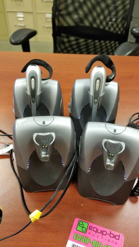 lot 9051 image: Plantronics wireless headsets with extra bases