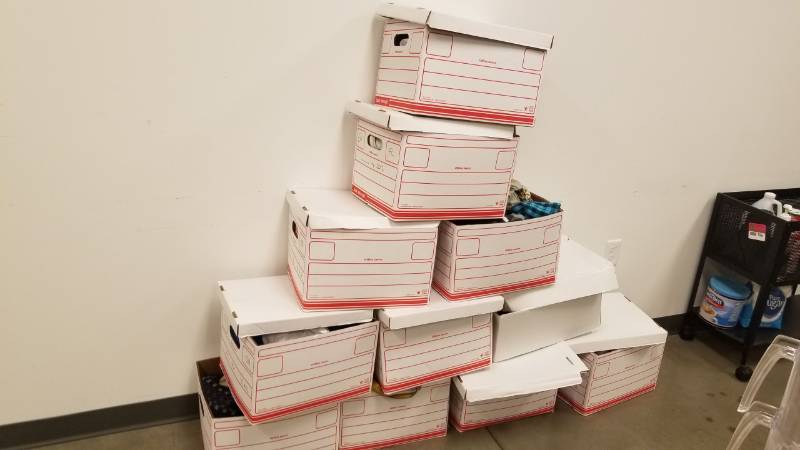 lot 9060 image: 11 cases of miscellaneous clothing