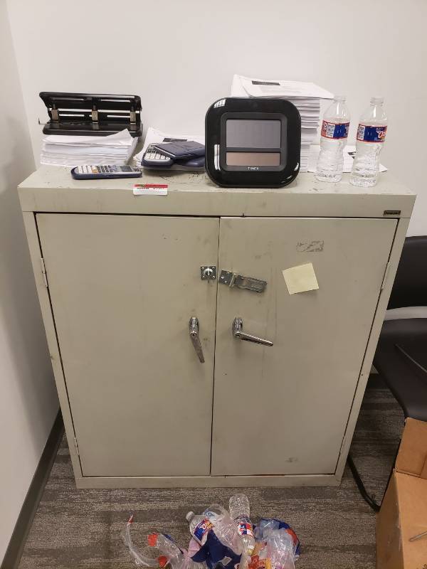 lot 9107 image: Metal storage cabinet with contents