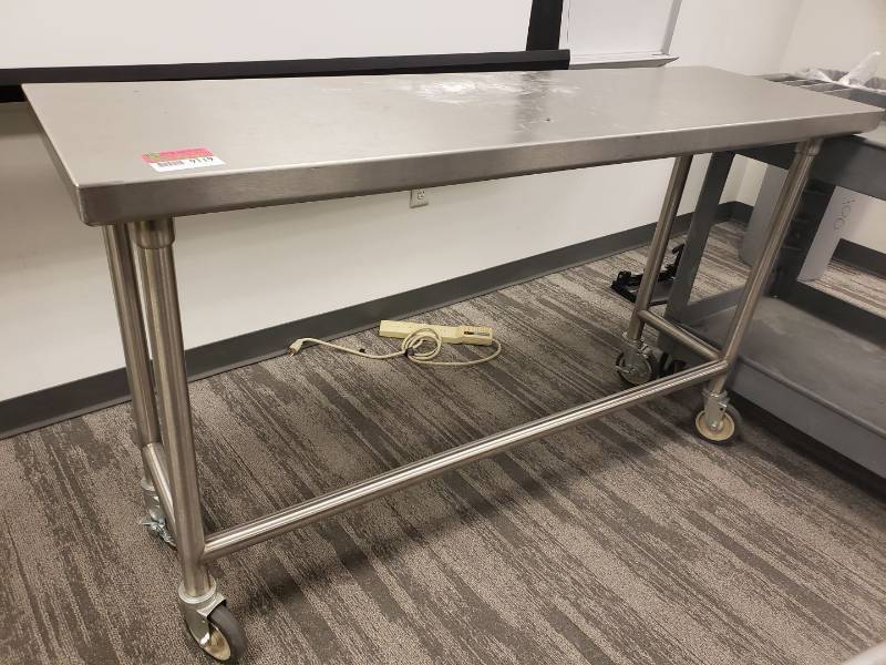 lot 9119 image: 60x18 all stainless table on wheels