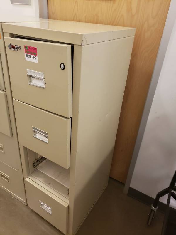 lot 9147 image: Fire King file cabinet - some damage