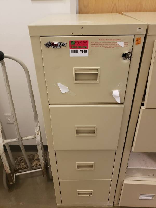 lot 9148 image: Fire King file cabinet some damage