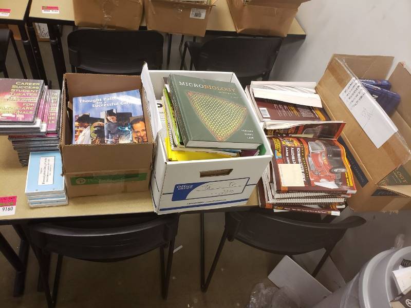 lot 9160 image: Lot of textbooks on table