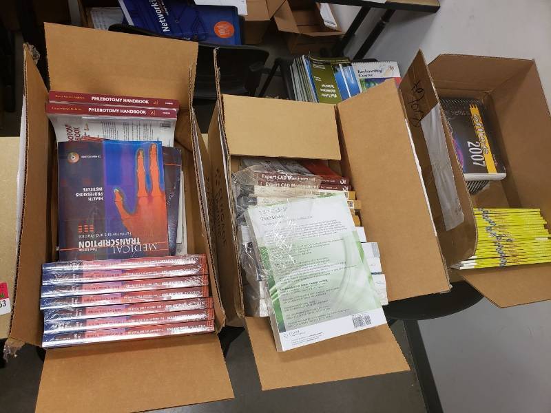lot 9163 image: Lot of textbooks on table