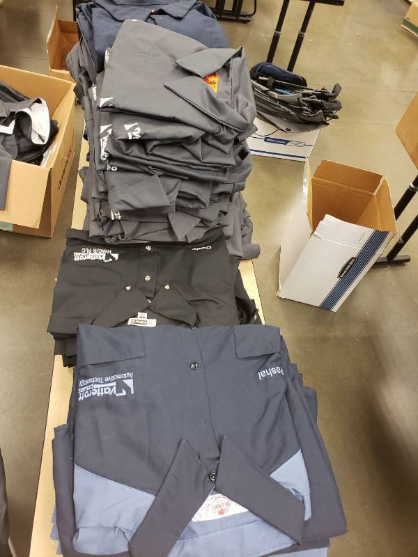 lot 9178 image: Lot of work shirts on table
