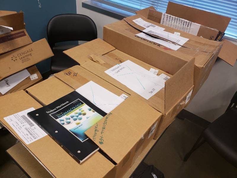 lot 9192 image: Lot of textbooks on table