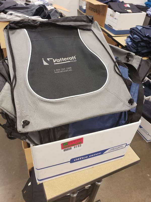 lot 9193 image: Box of backpacks