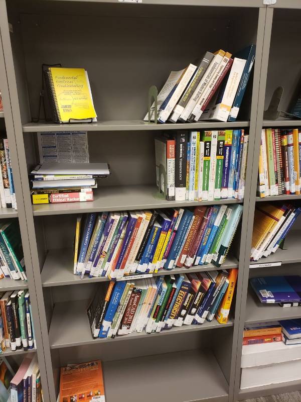 lot 9202 image: Lot of books in bookcase