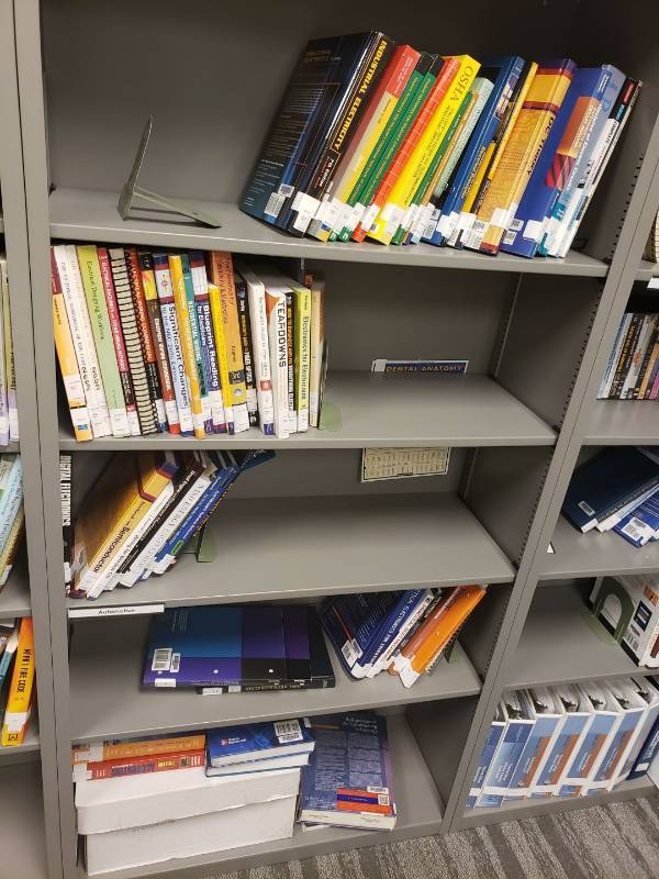 lot 9203 image: Lot of books in bookcase