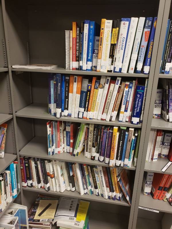 lot 9205 image: Lot of books in bookcase