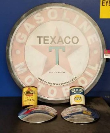 lot 8125 image: Texaco Sign, Hubcaps and Oil Cans