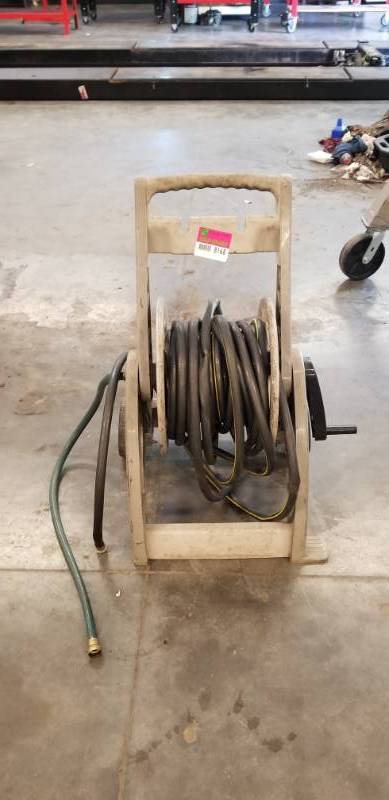lot 8168 image: Plastic Hose Reel Cart with Hose