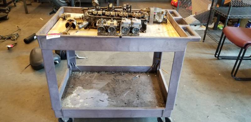 lot 9556 image: Parts Cart with Head, Carburetor Pieces  Parts