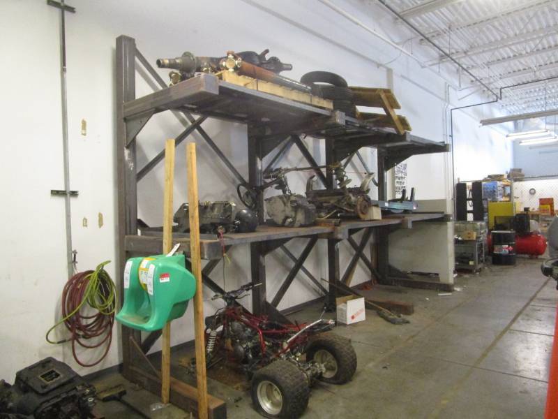 lot 9525 image: Cantilever Heavy Duty Rack with Parts and Pieces 4 Wheeler and Motorcycle Lift Not Included