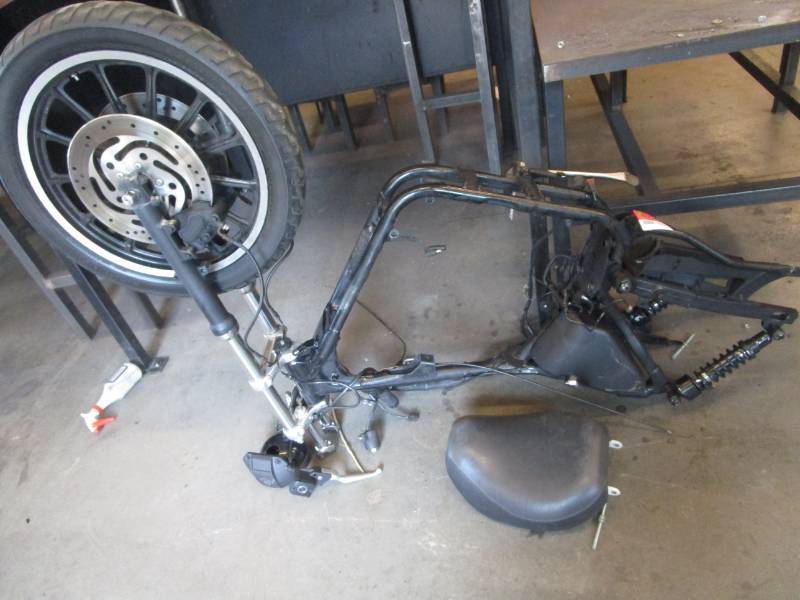 lot 9652 image: Motorcycle Wheel and Frame Parts  Pieces
