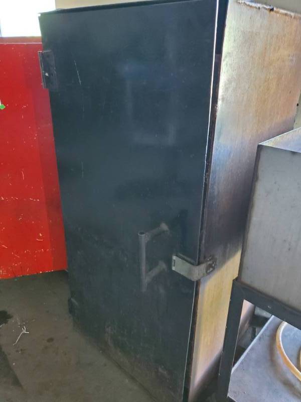 lot 9650 image: Metal Single Door Cabinet with Shelves and Contents Included